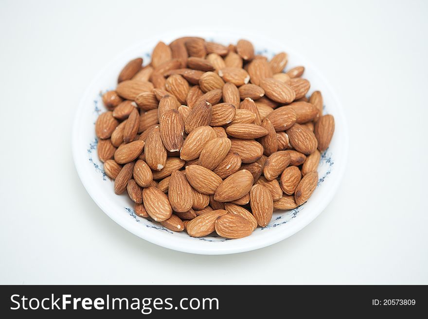 Contained in the almonds in a bowl appearance. Contained in the almonds in a bowl appearance.