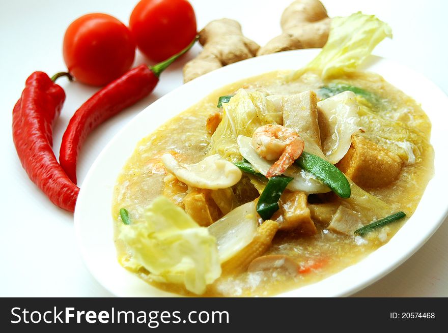 Tasty egg tofu cooked in 'Ladna' style is one of famous local Malay dish. Tasty egg tofu cooked in 'Ladna' style is one of famous local Malay dish.