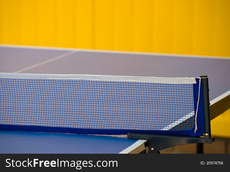 This is a table to play ping-pong, close-up. This is a table to play ping-pong, close-up.