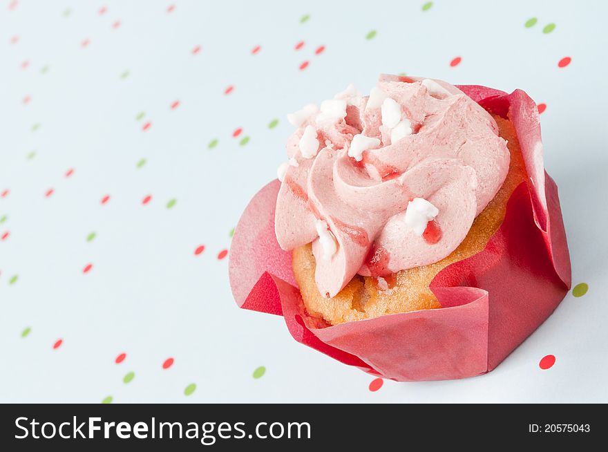 Celebration strawberry muffin with dots background