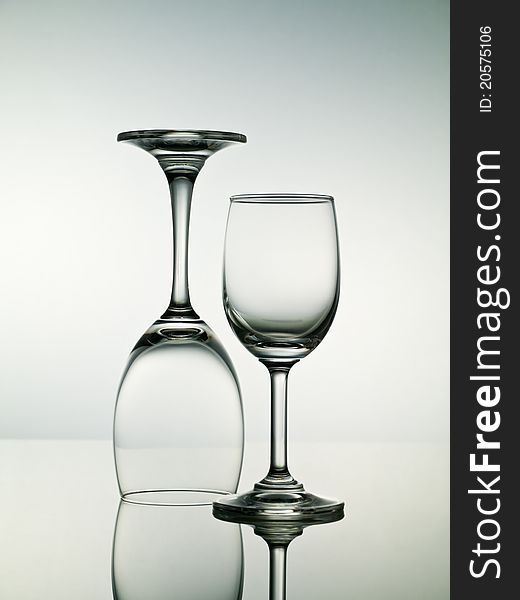 Two empty stemmed glasses for cocktail or wine