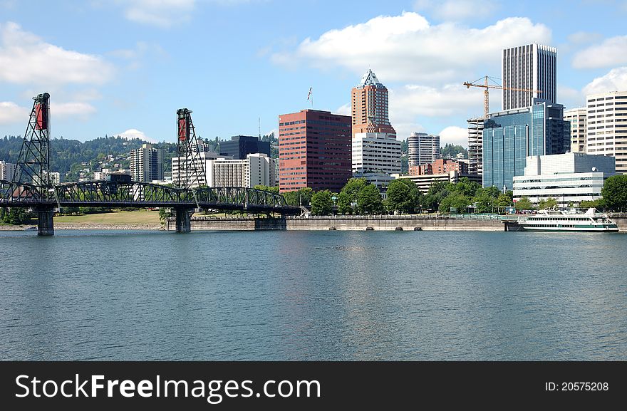 A Portland skyline and the spirit of Portland ship. A Portland skyline and the spirit of Portland ship.