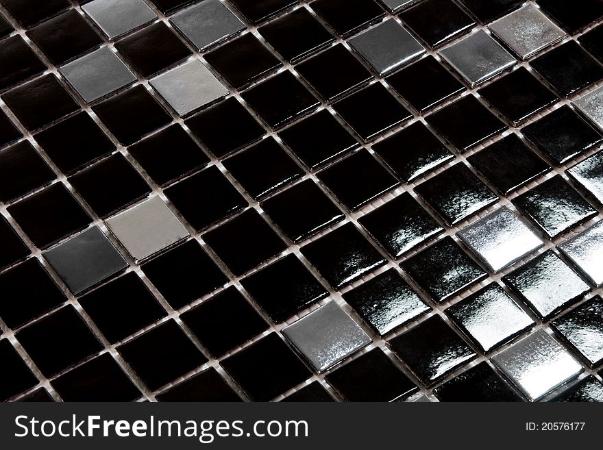 Small black and silver glazed tiles