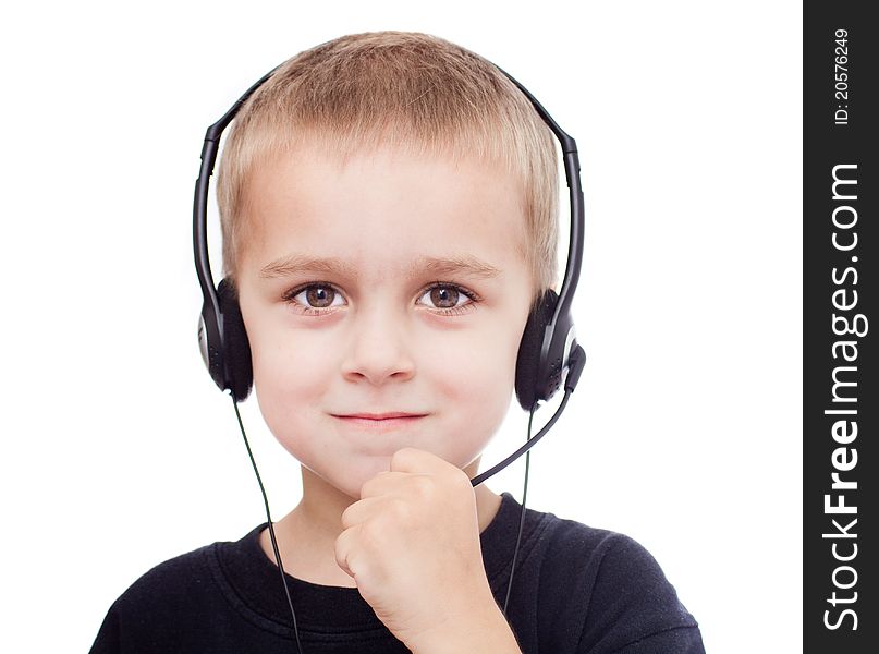 Portrait of little boy with headphones and microphone looking at camera, isolated on white