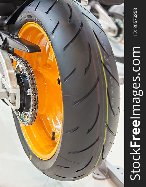 Image of a sports bike wheels with details. Image of a sports bike wheels with details.