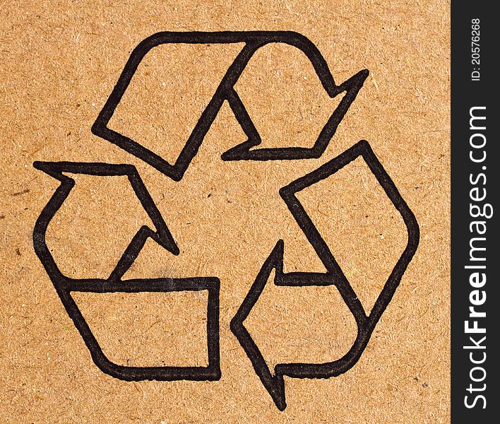Recycling sign on cardboard paper. Recycling sign on cardboard paper