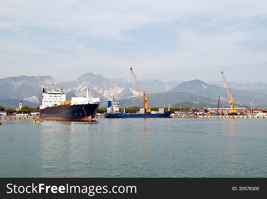 Commercial harbor in Marina di Carrara, Tuscany, Italy.