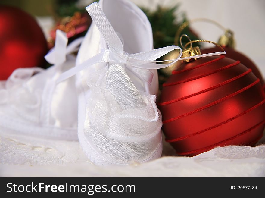 White shoes of a small child on a white background. White shoes of a small child on a white background