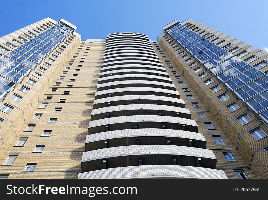 The high building against the sky. The high building against the sky