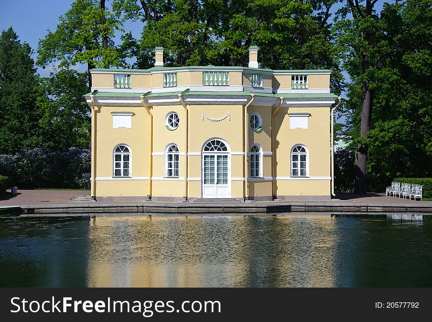 Antique baroque style lodge in the park by a pond. Pushkin ??city, Russia.