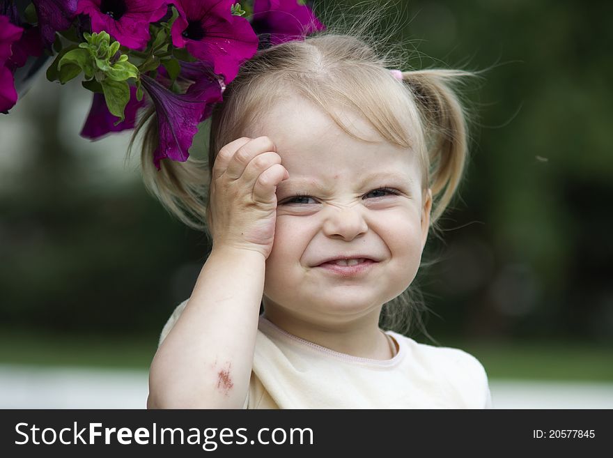 Amusing and laughing child in the garden. Amusing and laughing child in the garden