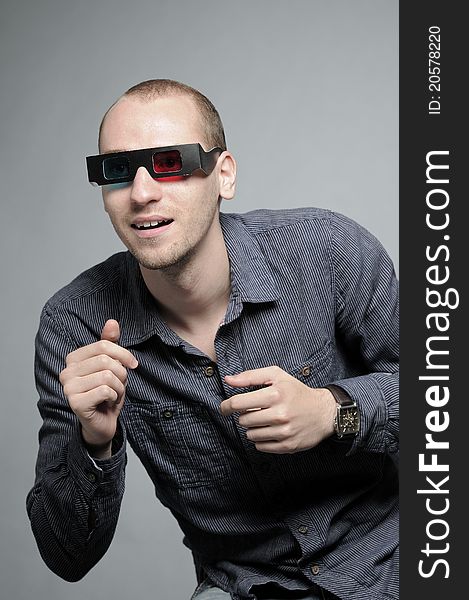 Young man watching movie with 3d glasses. Young man watching movie with 3d glasses