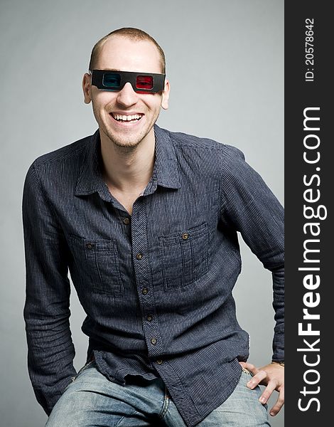 Man smiling with 3d glasses