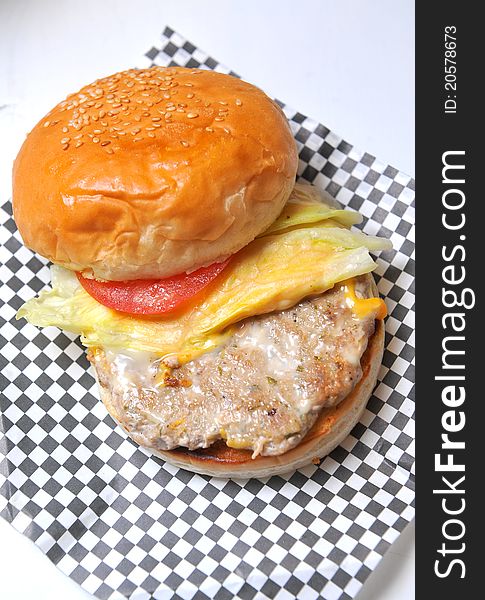 Big hamburger in food studio