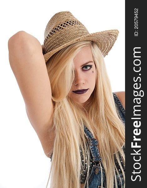 Beautiful young blonde female wearing staw hat