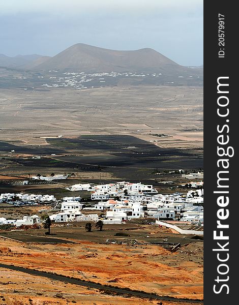 Isolated white houses village in a desert, Lanzarote, Canarias.