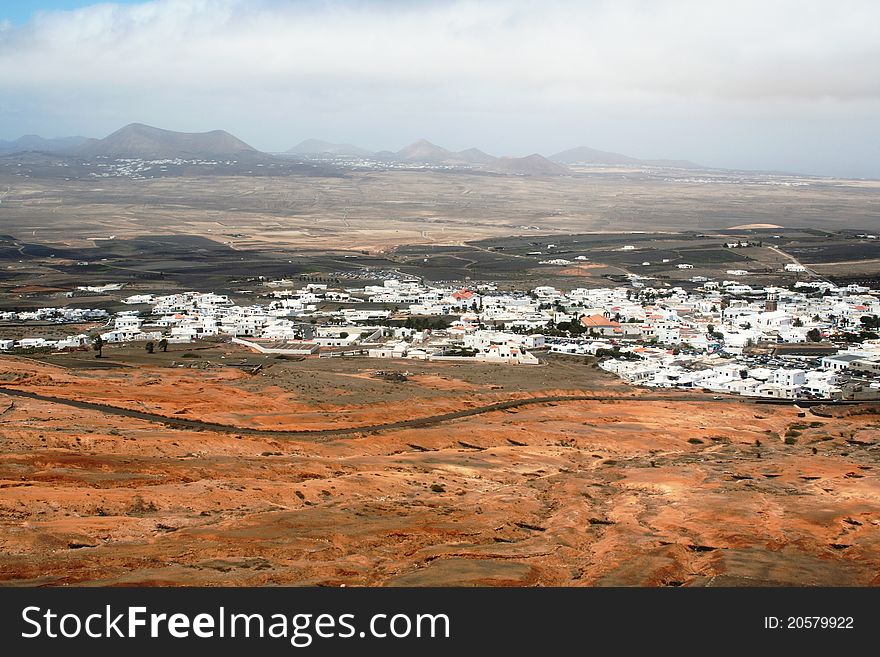 Isolated white houses village in desert, Lanzarote, Canarias. Isolated white houses village in desert, Lanzarote, Canarias.