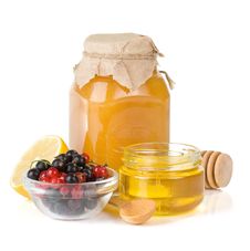 Glass Jar Full Of Honey, Lemon And Berry Royalty Free Stock Photo Glass Jar Full Of Honey, Lemon And Berry Royalty Free Stock Photo