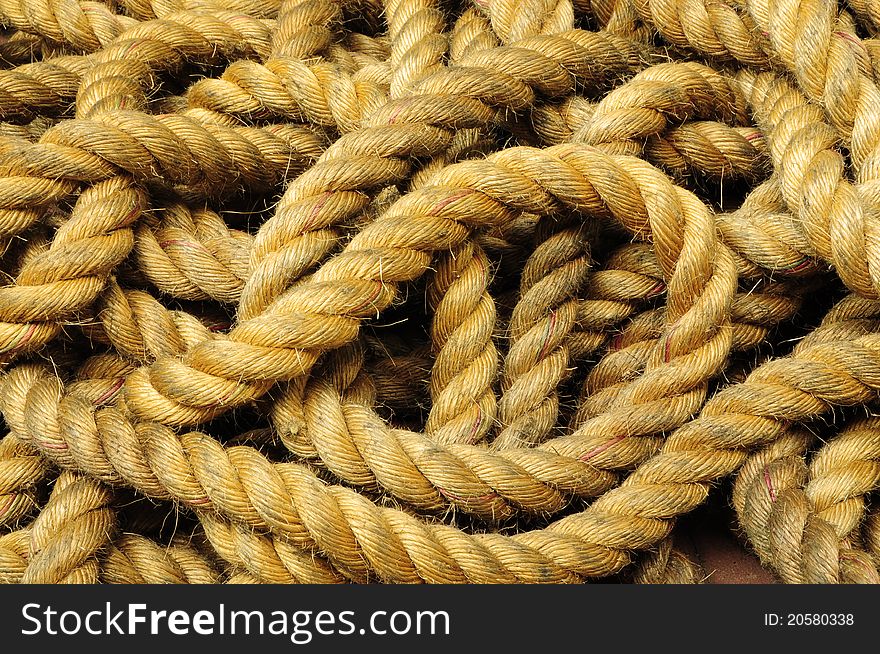 Rope coil on an antique chest. Rope coil on an antique chest