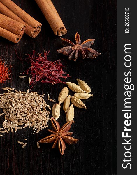 Mix of the spices on black table