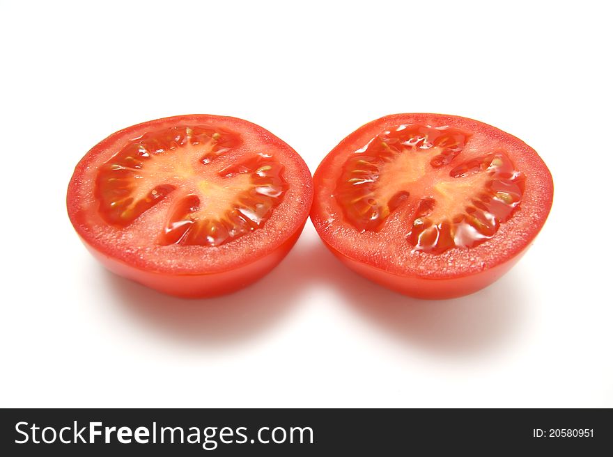 Tomato on a white background. Tomato on a white background