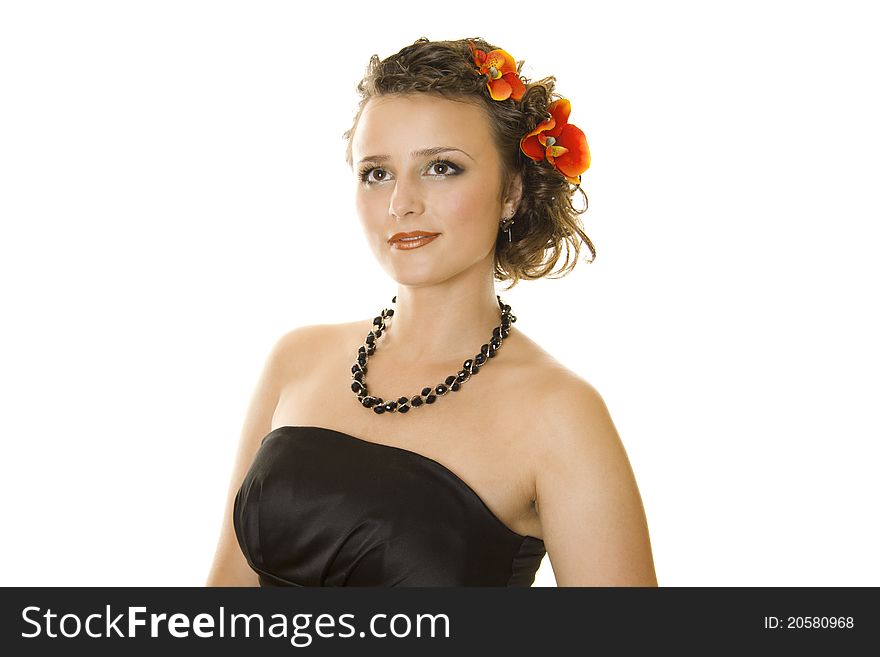Fashion model with large hairstyle and orchid in her hair. Fashion model with large hairstyle and orchid in her hair.