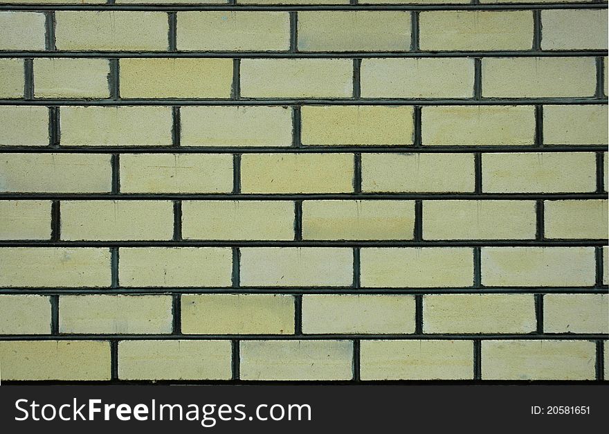 New wall made of yellow bricks. New wall made of yellow bricks