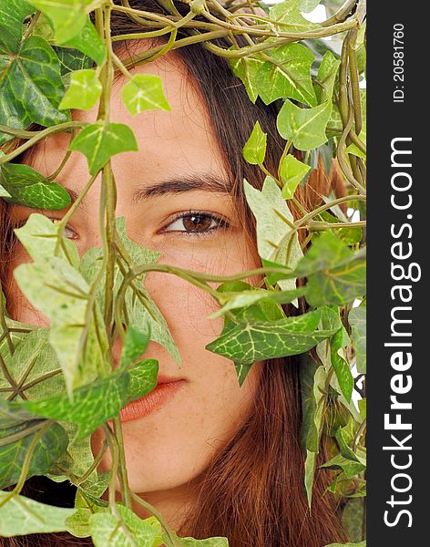 Girl Hiding Behind Ivy Leaves