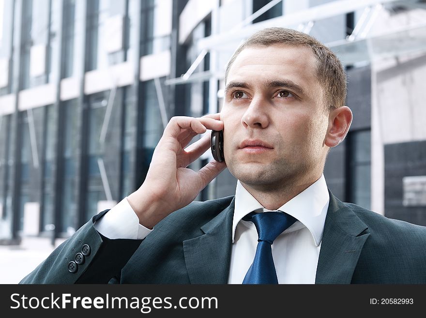 Young and successful businessman on the phone