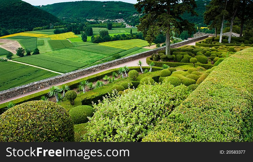 A view from the Jardins de Marqueyssac in France showing the gardens and the valley beypnd. A view from the Jardins de Marqueyssac in France showing the gardens and the valley beypnd