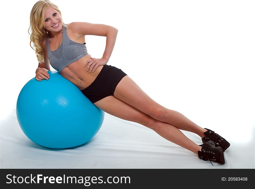 Beautiful Girl Stretching and Exercising with the ball. Beautiful Girl Stretching and Exercising with the ball