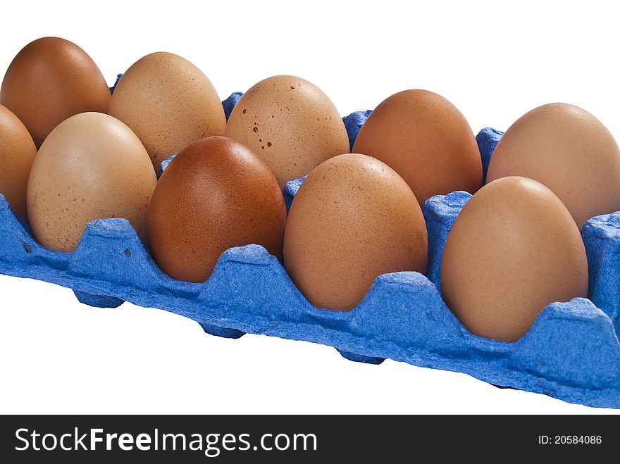 Eggs in the purple bin at an isolated white background. Eggs in the purple bin at an isolated white background.