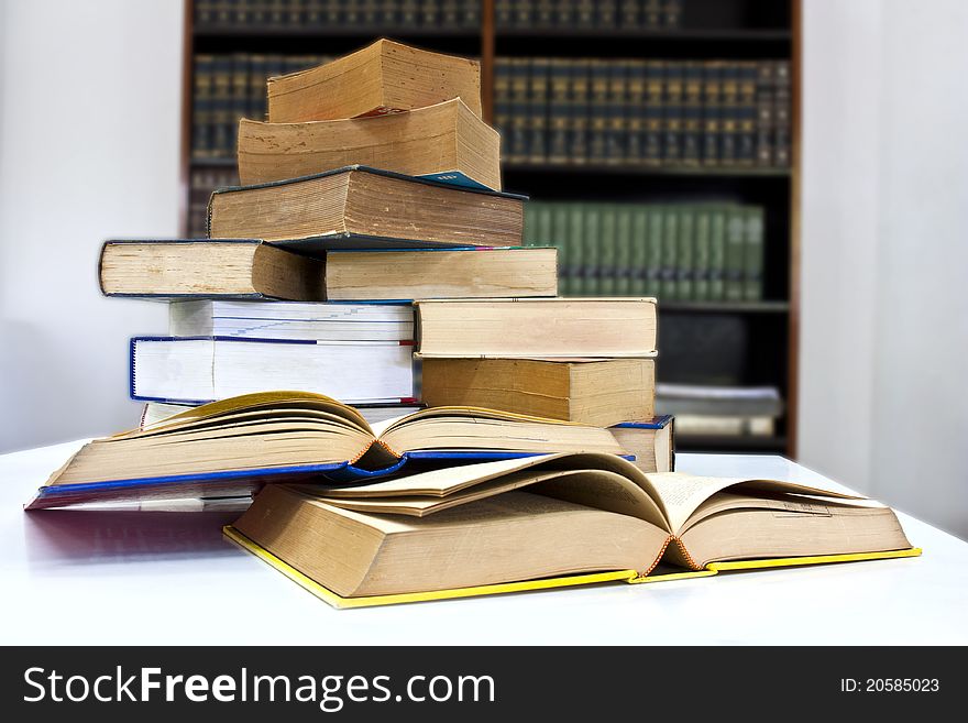 Pile of books in library with clipping path