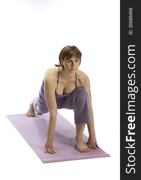 Young early pregnant woman practicing yoga 2