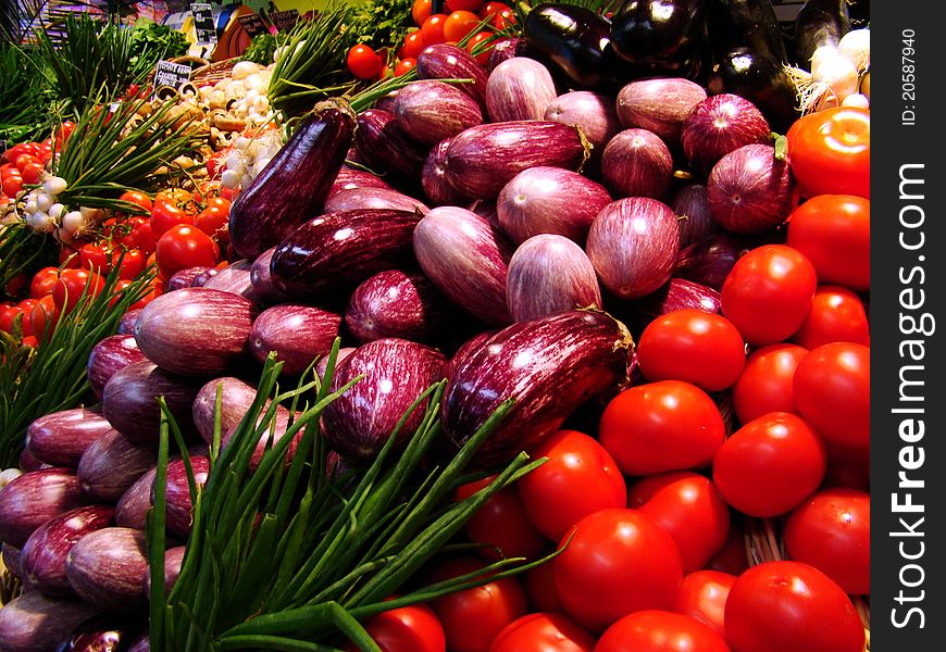 Eggplant, onion end tomatoes in the market. Eggplant, onion end tomatoes in the market
