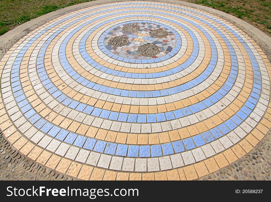 Ceramic tile concentric circles landscape architecture in a park. Ceramic tile concentric circles landscape architecture in a park