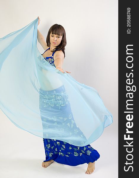 Model clothes while dancing to belly dancer