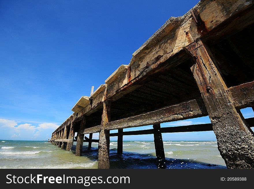 The old pier and blue sky. The old pier and blue sky