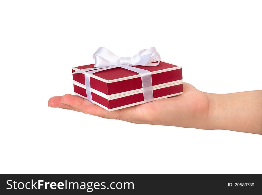 Gift box with ribbon in hand. Gift box with ribbon in hand