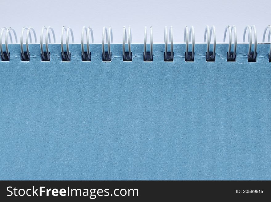 Blue sky color Cover Note Book on background