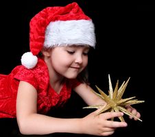Girl In Christmas Outfit Playing With Golden Star Royalty Free Stock Photo Girl In Christmas Outfit Playing With Golden Star Royalty Free Stock Photo
