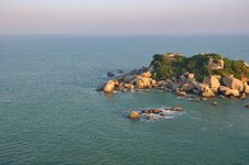 Small Island Under Sunrise On Sea Royalty Free Stock Photography Small Island Under Sunrise On Sea Royalty Free Stock Photography