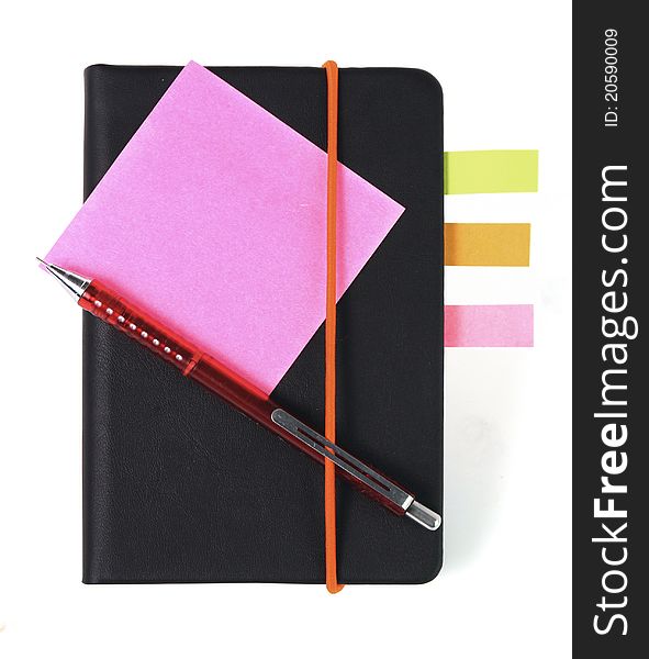 Black leather notebook with pen