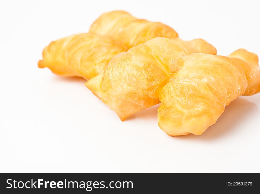 Fried bread stick isolated on white background