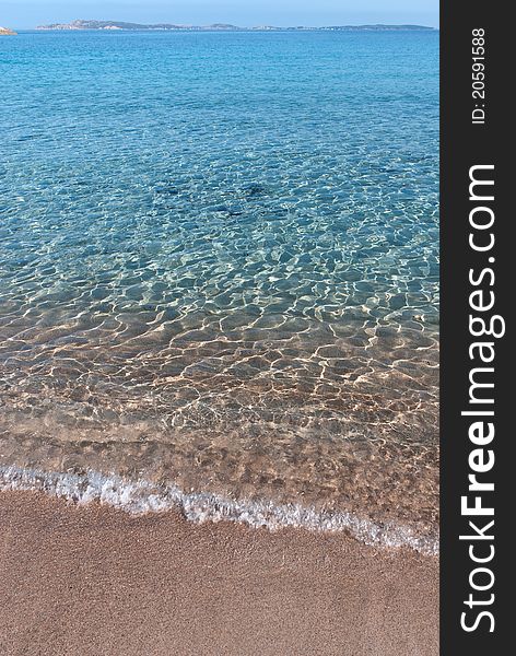 Clear sea on the beach on the island of La Maddalena Lower Trinity. Clear sea on the beach on the island of La Maddalena Lower Trinity