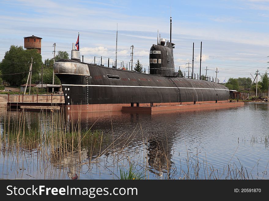 The Russian submarine costs in port. The Russian submarine costs in port