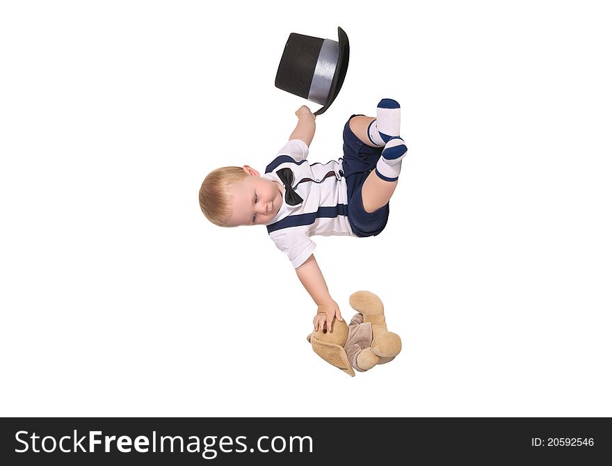 Baby boy with toy rabbit and cylinder hat