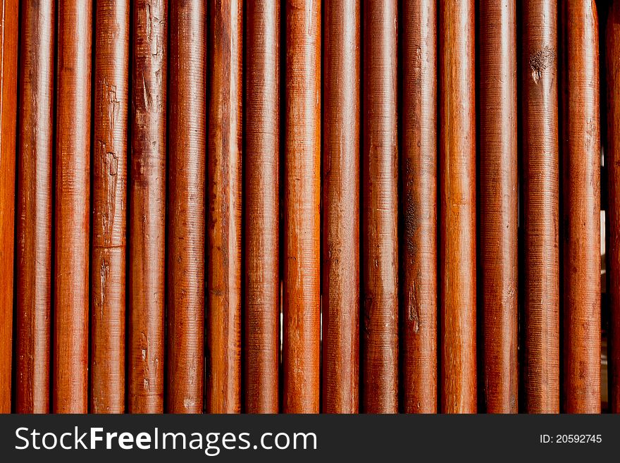 Simple round teak wood wall