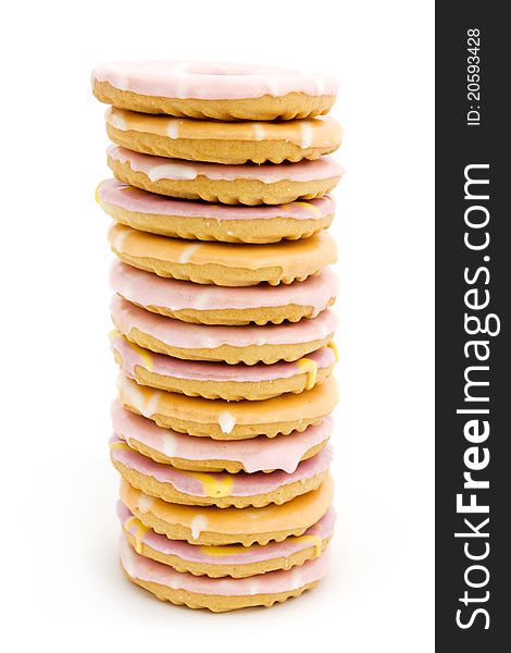 Tower of iced biscuits isolated on white. Tower of iced biscuits isolated on white