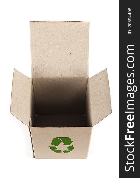 Green recycle sign on open paper box